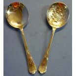 Large pair of Sheffield 1994 silver hallmarked fruit serving spoon, one with embossed floral and