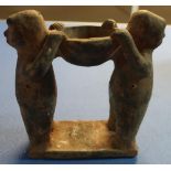 Tribal pottery incense burner figure in the form of two figures holding an offering bowl (18cm high)