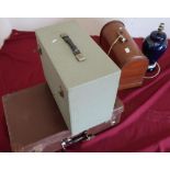 Cased vintage Singer sewing machine, vintage suitcase, ceramic table lamp and a cased Aldis