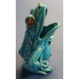 Burmantofts blue glazed figure of a frog, the base marked B1228 457 EV, with glass eye (one eye A/F)