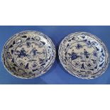 Large pair of Chinese blue & white shallow chargers with central panels depicting figures on