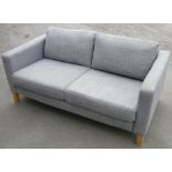 Modern two seat sofa on light wood supports (width 163cm)
