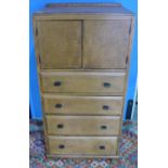 Circa 1920/30s oak tallboy cabinet with two cupboard doors above four drawers (61cm x 41cm x 126cm)