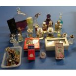 Box containing a large selection of various assorted perfume/scent bottles, some with contents
