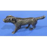 Cast bronze figure of a sporting dog (6cm high)