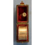 Cased Birmingham silver hallmarked napkin ring and a Birmingham 1909 silver hallmarked thimble (2)