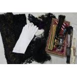 Collection of various vintage clothing accessories including starched collars, white gloves, glass