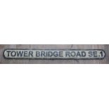 Black and white painted carved wood Tower Bridge Road SE1 sign (length 148cm)