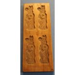 Rectangular carved wood gingerbread mould, with four mould sections in the form of kings (16cm x