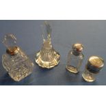 Three silver hallmarked topped glass scent bottles and another glass scent bottle (4)