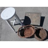 White painted circular top country style stool and a slipper bin and two wicker baskets