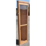 Modern light oak free standing corner unit enclosed by single glazed door (height 194cm)