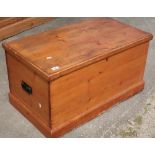 Late Victorian stained pine tall type chest with hinged lift up top, twin carrying handles and