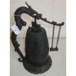 Cast bronze eastern temple type bell with stand in the form of a dragon (30cm high)