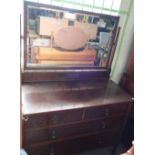 Early - mid 20th C oak dressing chest with raised bevelled edge mirror back, above two short drawers