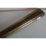 Twelve Edwardian brass stair rods