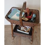 Early to mid 20th C bamboo and wicker work two tier sewing type table with various accessories,