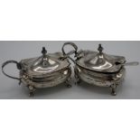 Pair of Birmingham silver hallmarked salts complete with spoons and blue glass liners