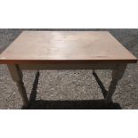 Rectangular farmhouse style table with pine scrub top and painted base, on turned supports (137cm