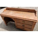 Victorian pine kneehole desk with raised back and sides and three drawers to one side (147cm x