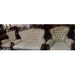 Victorian style three piece suite comprising of two seat sofa and pair of matching armchairs, with