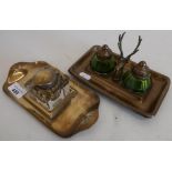 Brass topped glass inkwell on brass twin handled tray and another double inkwell with stags head