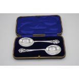Cased pair of Sheffield silver hallmarked spoons