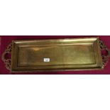 Rectangular engraved eastern brass tray with twin carrying handles (74cm x 22.5cm)