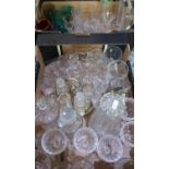 Two boxes of various assorted drinking glasses, cut glasses, decanters, cruet sets etc