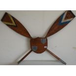Rowing wall mounted trophy type plaque in the form of two cut down oars with central shield panel (