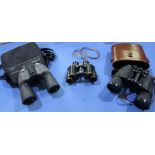 Cased pair of military type binoculars by Taylor 1941,no. MKII and two other pairs of binoculars