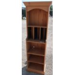 Free standing pine bookcase/CD rack (48cm x 28cm x 173cm)