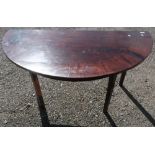 19th C mahogany D shaped table on four supports (141cm x 69cm x 70cm)