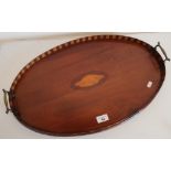 Edwardian mahogany inlaid oval twin handled tray with raised sides and central inlaid shell