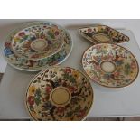 Selection of five various assorted tree and floral pattern chargers and plates