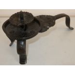 Japanese bronze candle stand with raised sconce, on three mounted supports (approx height 17cm)