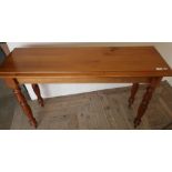 Modern pine rectangular hall table on turned supports (120cm x 40cm x 77cm)