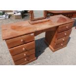 Pine twin pedestal dressing table with free standing mirror and four drawers to each pedestal (width