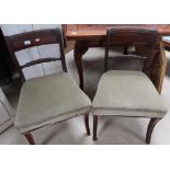 Pair of 19th C mahogany saber leg dining chairs with upholstered seats and rope twist backs