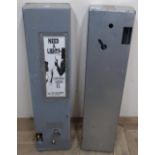 Two wall mounted cigarette lighter vending machines