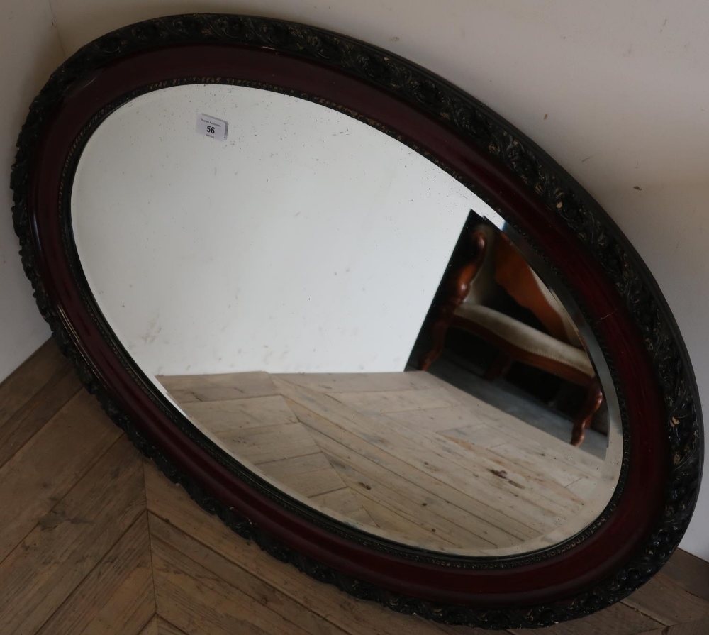 Pair of oval bevel edged wall mirror with carved frames (84cm x 62cm) (2)