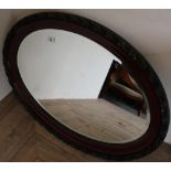 Pair of oval bevel edged wall mirror with carved frames (84cm x 62cm) (2)
