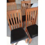 Set of four modern oak slat back dining chairs with leather upholstered seats