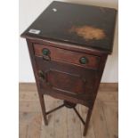 Mahogany pot cupboard with single drawer above paneled door and X shaped understretcher