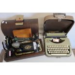 Oak cased vintage Singer sewing machine and a travelling type writer (2)