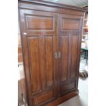 Early 20th C oak two door combination wardrobe with fitted interior (141cm x 68cm x 206cm)