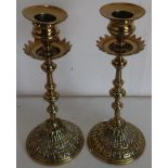 Pair of late 19th C brass candlesticks with embossed detail (height 20cm)