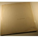 The Beatles White Album No. 0144682, with lyrics, poster and full colour photos (missing one black