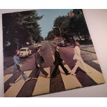 A The Beatles First Pressing Abbey Road, with misaligned Apple symbol on rear, LP record