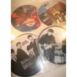 Four The Beatles picture disc records including A Collection of The Beatles Oldies Amiga 855383, The